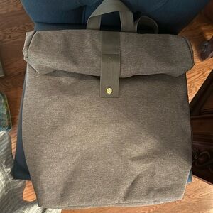 Like new back pack never used. Roll top.